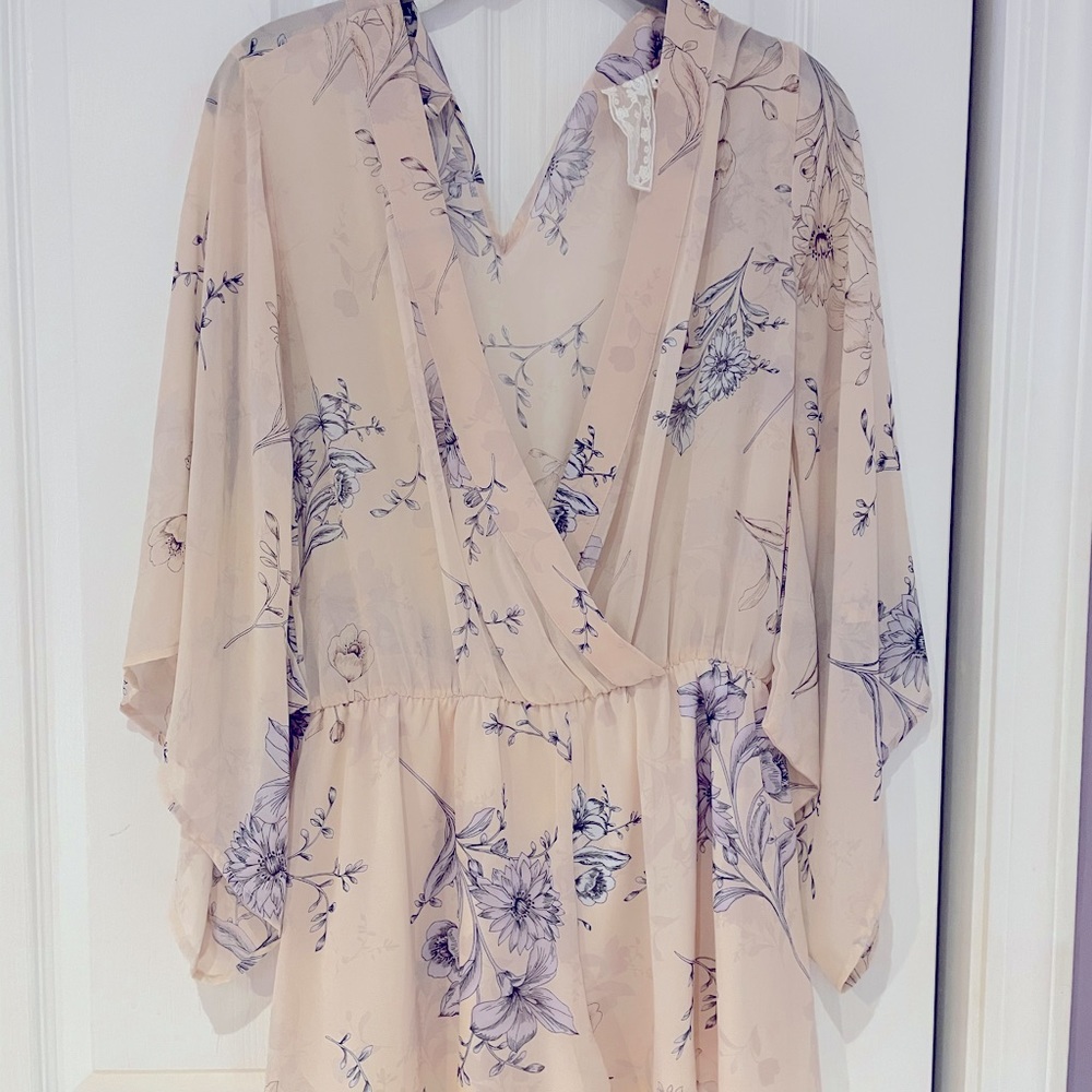 Elegant, low plung romper